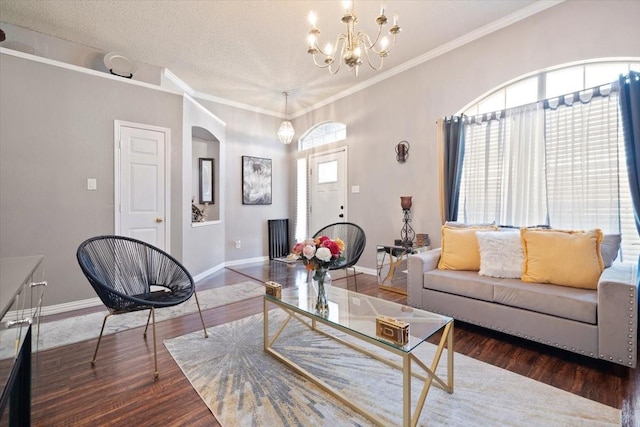 living area featuring dark wood-style floors, plenty of natural light, and baseboards