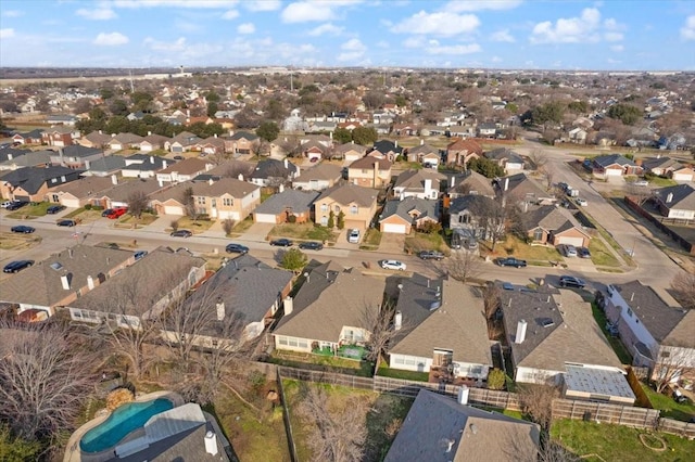 birds eye view of property with a residential view