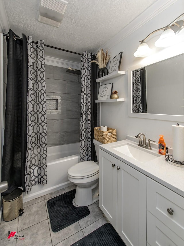 bathroom featuring tile patterned flooring, shower / bath combo, a textured ceiling, and vanity