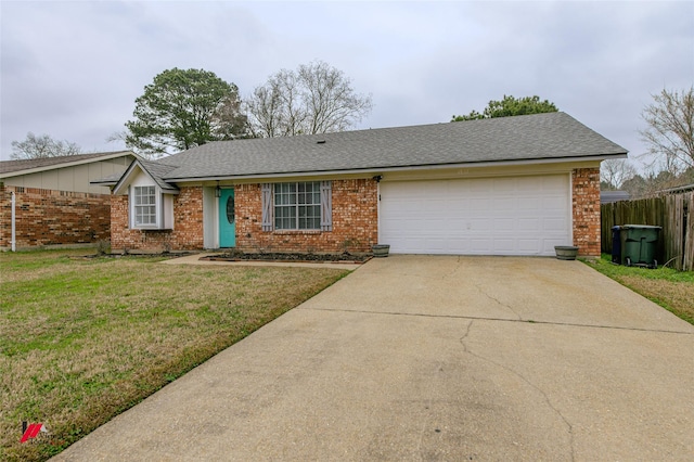 ranch-style house with a garage, brick siding, concrete driveway, roof with shingles, and a front lawn