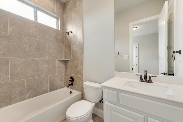 full bathroom featuring toilet, tub / shower combination, and vanity