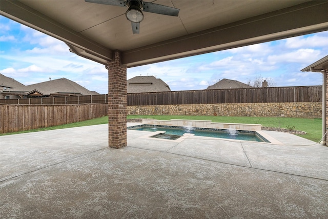 view of pool featuring ceiling fan, a patio, a fenced backyard, and a fenced in pool