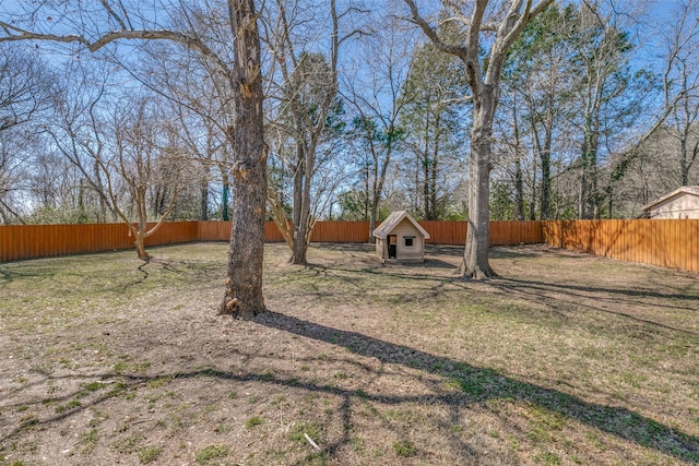 view of yard with a fenced backyard