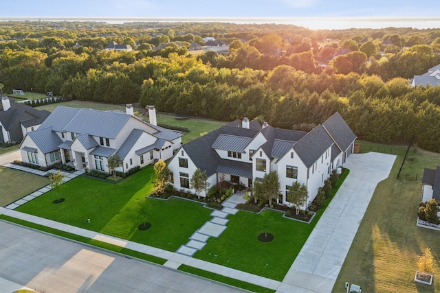 bird's eye view with a residential view and a wooded view