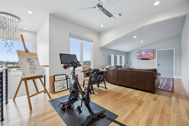 workout area with light wood-type flooring, visible vents, and recessed lighting