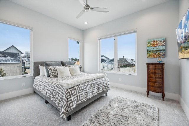 carpeted bedroom with ceiling fan, recessed lighting, and baseboards