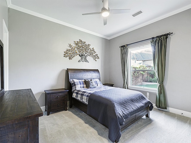 bedroom featuring light carpet, ornamental molding, and visible vents