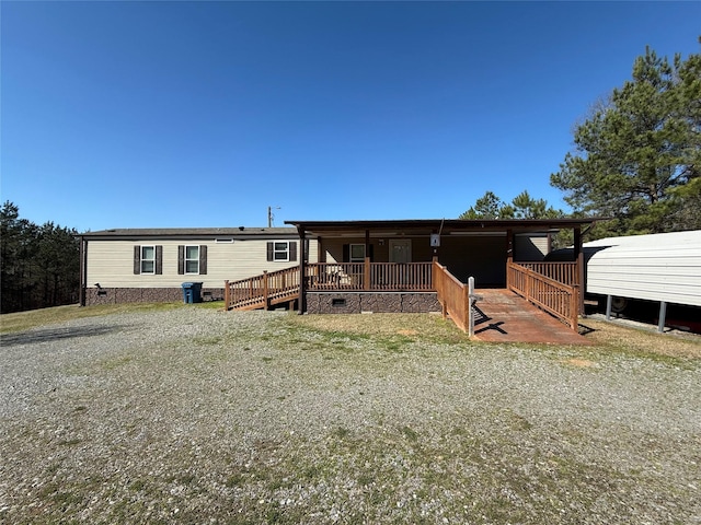 view of front of home featuring crawl space