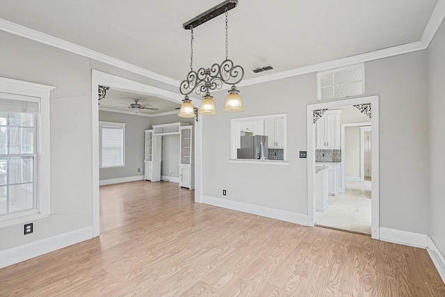 111 S Pine St, Roanoke, TX 76262 - bathroom with toilet, a freestanding bath, a sink, and ornamental molding
