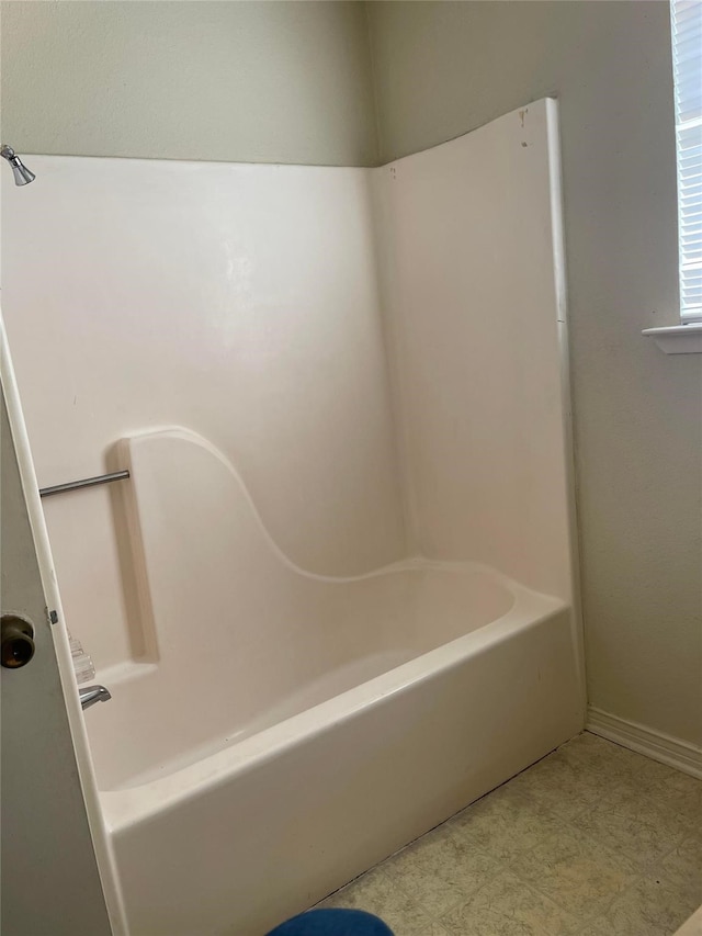 full bathroom with a bathtub