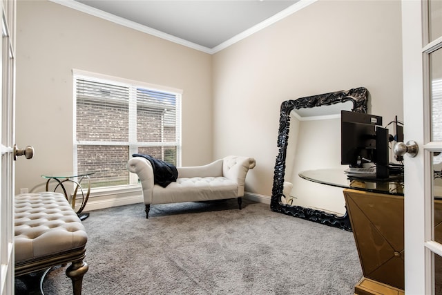 sitting room featuring ornamental molding, carpet, and baseboards