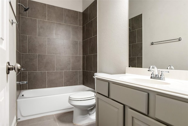 full bath with toilet, shower / washtub combination, vanity, and tile patterned floors