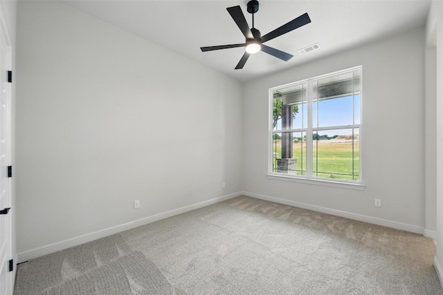201 Rio Rancho Dr, Decatur, TX 76234 - empty room featuring baseboards, carpet, and a ceiling fan