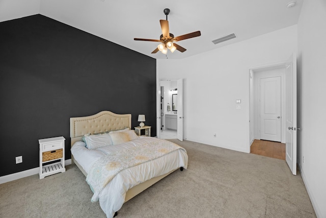 bedroom featuring lofted ceiling, visible vents, a ceiling fan, light carpet, and baseboards