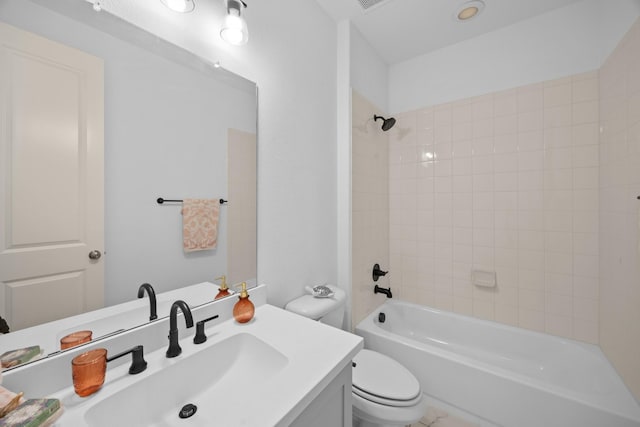 bathroom with toilet, visible vents, tub / shower combination, and vanity