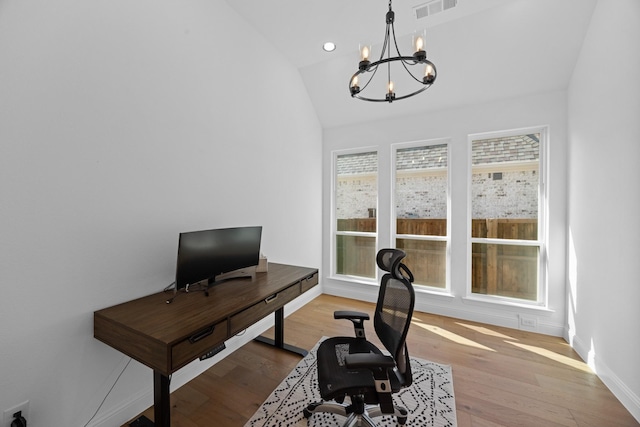 office with a chandelier, recessed lighting, visible vents, vaulted ceiling, and light wood-type flooring