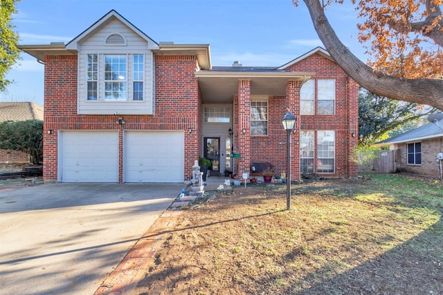 view of front facade with a garage, concrete driveway, and brick siding