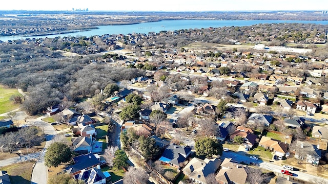 aerial view featuring a water view and a residential view