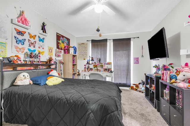 bedroom with carpet, ceiling fan, and a textured ceiling