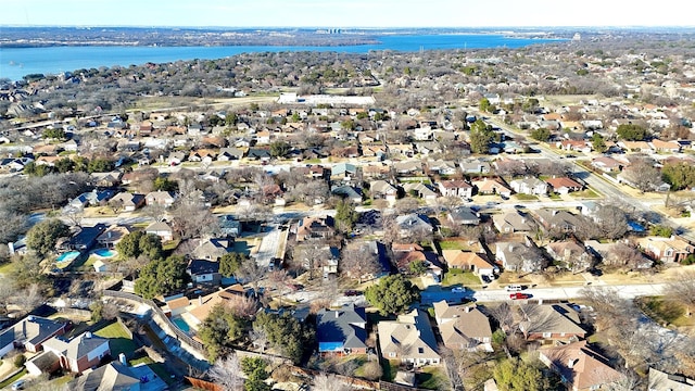 bird's eye view featuring a residential view and a water view