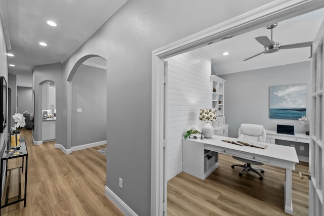 office area featuring ceiling fan, arched walkways, recessed lighting, baseboards, and light wood-type flooring