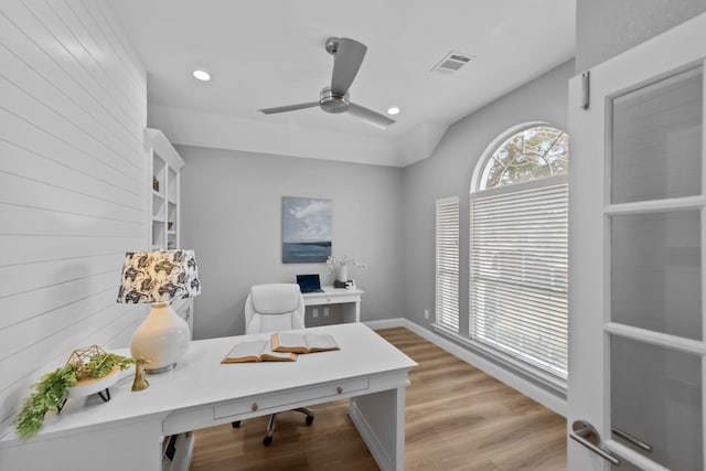 office featuring visible vents, baseboards, light wood-style flooring, ceiling fan, and recessed lighting