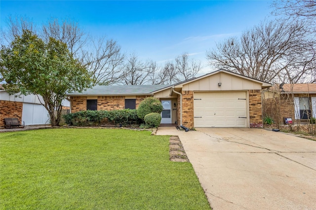 view of front of property featuring a garage, brick siding, and a front yard