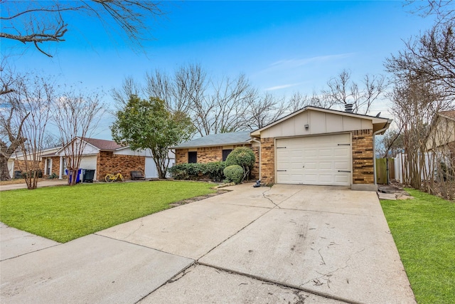 ranch-style house with brick siding, board and batten siding, a front yard, a garage, and driveway