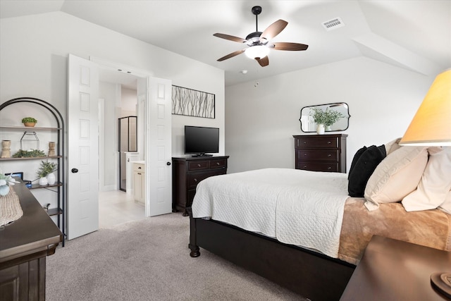 bedroom with lofted ceiling, light colored carpet, ceiling fan, and visible vents