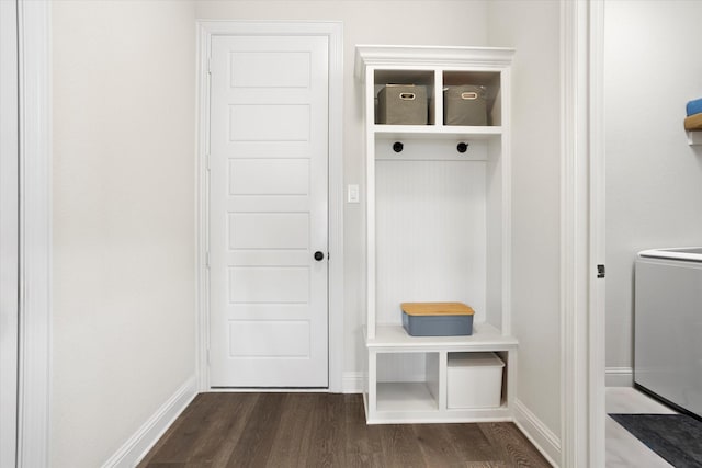 mudroom featuring washer / dryer, dark wood finished floors, and baseboards