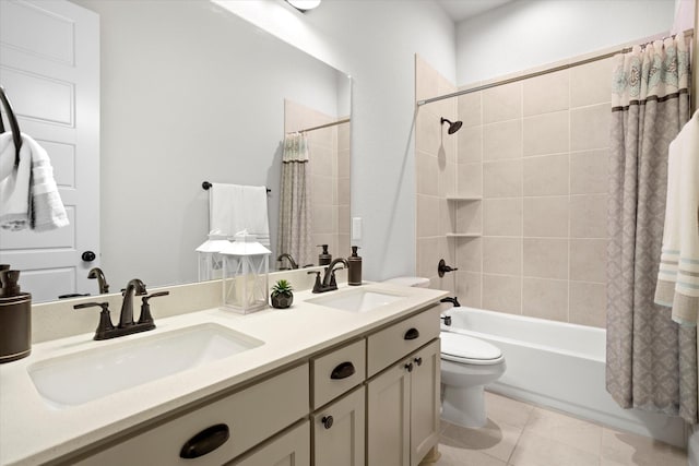 bathroom featuring double vanity, tile patterned flooring, a sink, and shower / bathtub combination with curtain