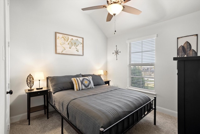 bedroom with carpet floors, lofted ceiling, ceiling fan, and baseboards