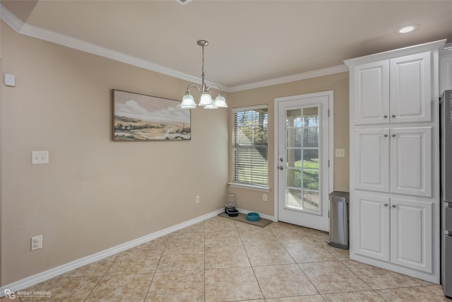 unfurnished dining area with light tile patterned floors, baseboards, ornamental molding, and a chandelier