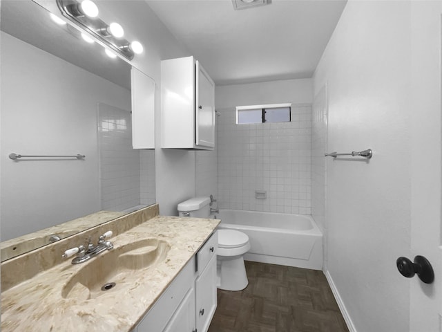 bathroom with baseboards, shower / tub combination, vanity, and toilet