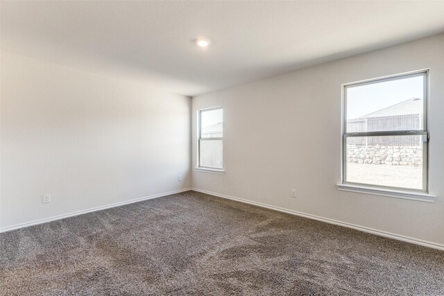 1023 Bedias Rd, Forney, TX 75126 - carpeted spare room with baseboards