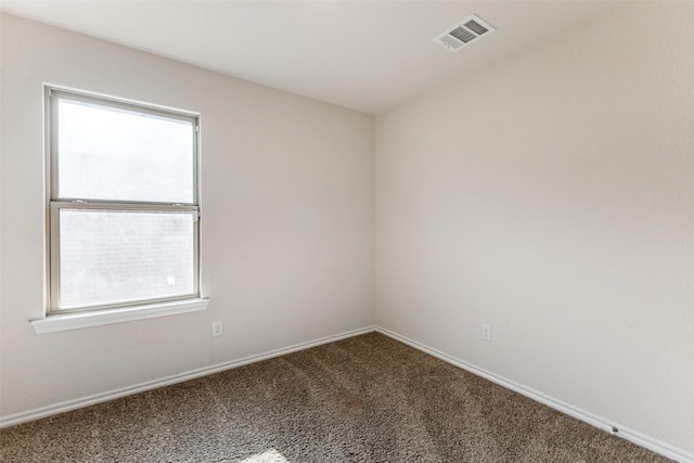 1023 Bedias Rd, Forney, TX 75126 - carpeted empty room with a healthy amount of sunlight, baseboards, and visible vents