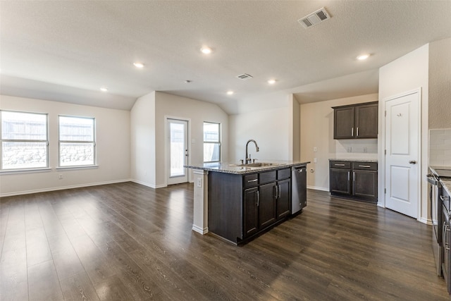 1023 Bedias Rd, Forney, TX 75126 - kitchen with a kitchen island with sink, a sink, visible vents, vaulted ceiling, and stainless steel dishwasher