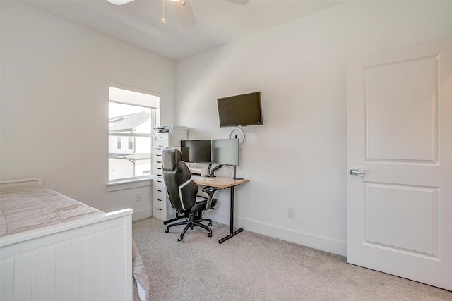 bedroom with ceiling fan, baseboards, and light colored carpet