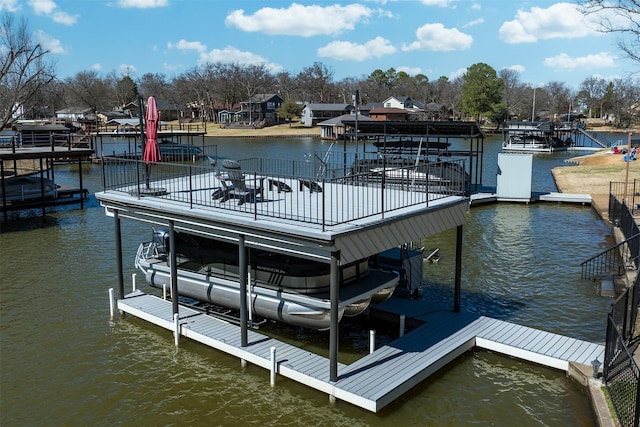 view of dock with a water view and boat lift