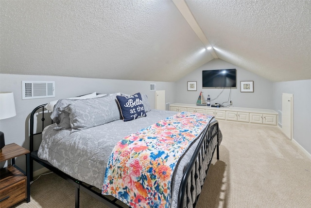 carpeted bedroom with lofted ceiling, baseboards, visible vents, and a textured ceiling