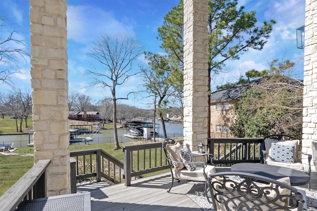 wooden deck with a yard