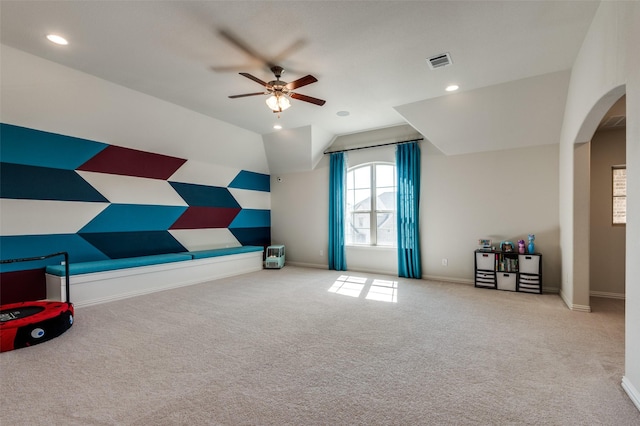 bonus room with arched walkways, carpet flooring, visible vents, baseboards, and vaulted ceiling