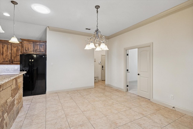 unfurnished dining area featuring visible vents, crown molding, baseboards, and light tile patterned flooring