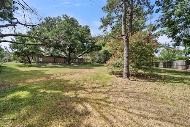 view of yard with fence