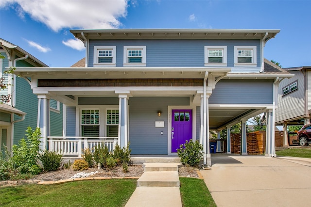 view of front of home with a porch, concrete driveway, roof with shingles, and a carport