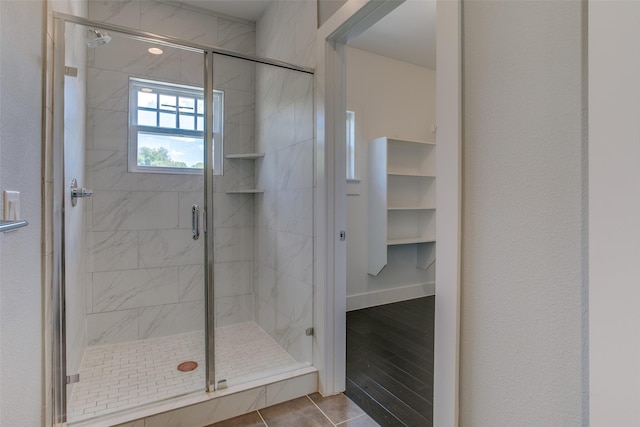 bathroom featuring a shower stall