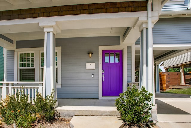 entrance to property with a porch