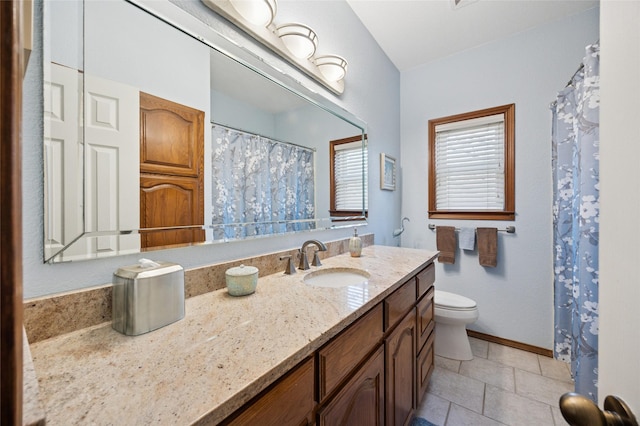 full bathroom with toilet, tile patterned flooring, vanity, and baseboards