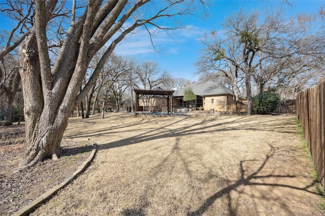 exterior space with a fenced backyard