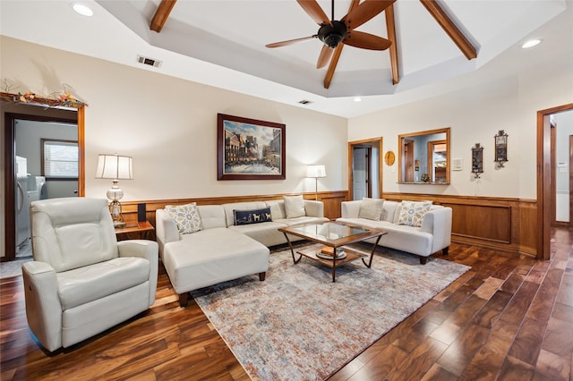 living room featuring visible vents, a wainscoted wall, dark wood-type flooring, beamed ceiling, and recessed lighting